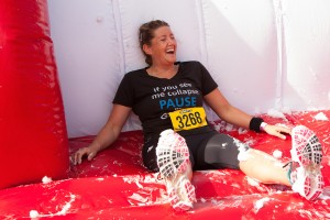 One tired runner takes a well-earned rest during  an event copy